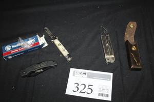 lot 325 image: Lot of (3) Smith & Wesson Folding Knife, Bottle Opener, Leatherman Multi-tool