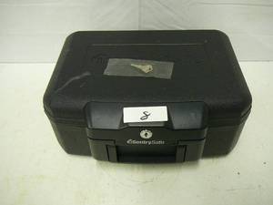 lot 8 image: Sentry Safe with Key