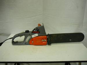 lot 10 image: Remington 12 Amp 16 Chain Saw Works