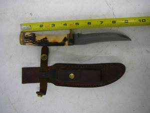 lot 79 image: Knife with Sheaf Schrode USA 153UH