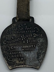 lot 6 image: Cincinnati Horse Shoe and Iron Watch Fob