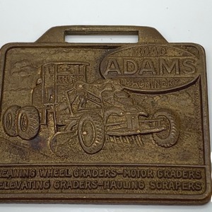 lot 3 image: Road Adams Machinery Watch Fob