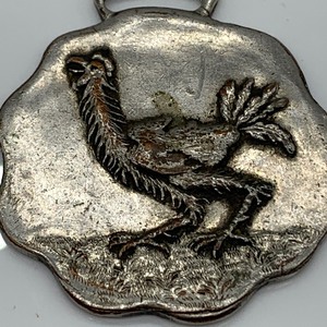 lot 9 image: Vintage- The Aultman & Taylor Machinery Co Watch Fob