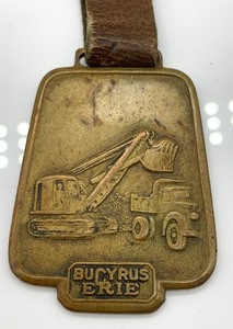 lot 21 image: Bucyrus Erie Vintage Watch Fob