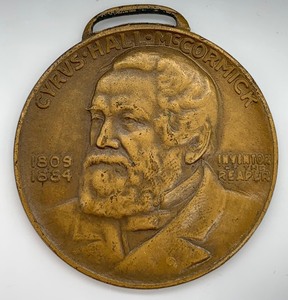 lot 19 image: Vintage Watch Fob Cyrus Hall-McCormick Watch Fob