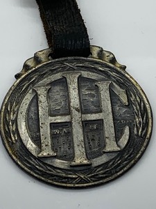 lot 20 image: International Harvester Company of America Vintage Watch Fob