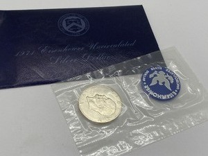 lot 106 image: Blue Ike - 1971 Eisenhower Uncirculated Silver Dollar