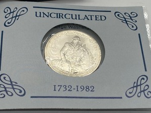 lot 108 image: Uncirculated George Washington Silver Commemorative Half Dollar Coin