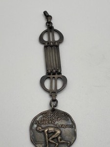 lot 111 image: Antique 1904 Cook County High School Athletic League Watch Fob