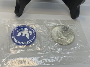lot 121 image: Blue Ike - 1971 Eisenhower Uncirculated Silver Dollar