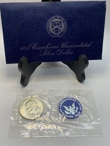 lot 128 image: Blue Ikes - 1971& 1974 Eisenhower Uncirculated Silver Dollars