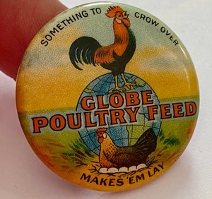 lot 54 image: Old Globe Poultry Feed Advertising Pinback Button