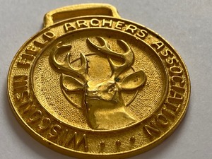lot 42 image: Wisconsin Field Archers Association Deer Buck Gold Toned Pocket Watch Fob
