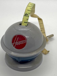 lot 167 image: Vintage Hoover Vacuum Cleaner Tape Measure