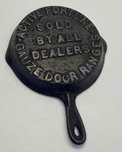 lot 200 image: Antique Advertising Cast Iron Miniature Skillet