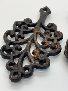 lot 227 image: Vintage Griswold Trivet and Miniature Cast Iron Pan