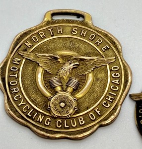lot 235 image: Vintage North Shore Motorcycling Club of Chicago Watch Fob and Pin.