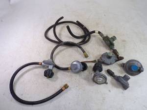 lot 22 image: 7 Propane Regulators  and Hose