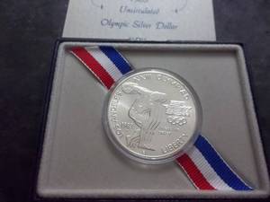 1983 Uncirculated Olympic Silver Dollar With POA. .900 Fine.  1984 Los Angeles