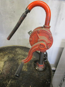 lot 123 image: 55 gal Oil Drum & Hand Crank Pump