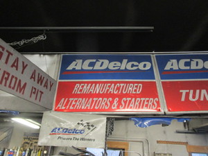 lot 257 image: AC Delco Tin Signs