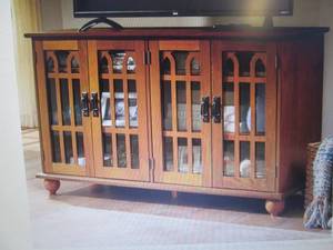 lot 70 image: Arched-Door Mission Style 4-Door TV...