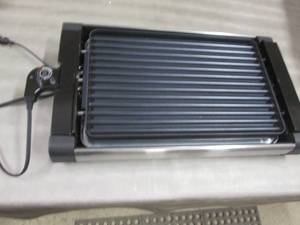 lot 92 image: Ginnys Reversible Electric GrillG...