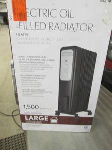 lot 173 image: 1,500-Watt Oil-Filled Radiant Elect...