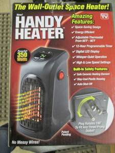 lot 211 image: 350-Watt Wall Outlet Handy Heater o...