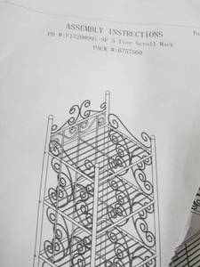 lot 134 image: 5 Tier Scroll Rack in Red open box...