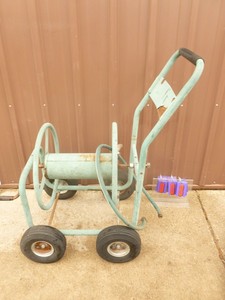 4 wheel hose reel. As shown.