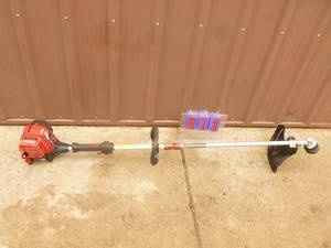 Craftsman 4 cycle line trimmer. Appears nearly new. Tested & works. As shown.