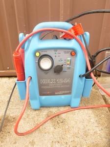 1224 volt booster pack. Very little use. Appears to need a new battery. As shown.