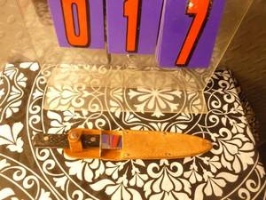 Small Imperial hunting knife with sheath. As shown.