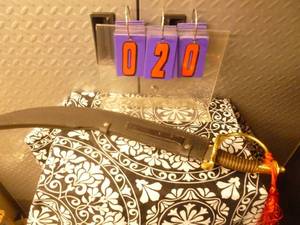 Curved cutlass with sheath. As shown.