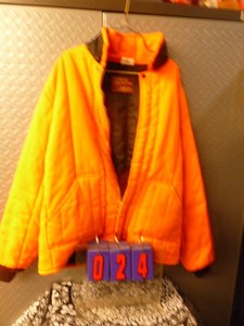 Orange hunting jacket. Size large. As shown.