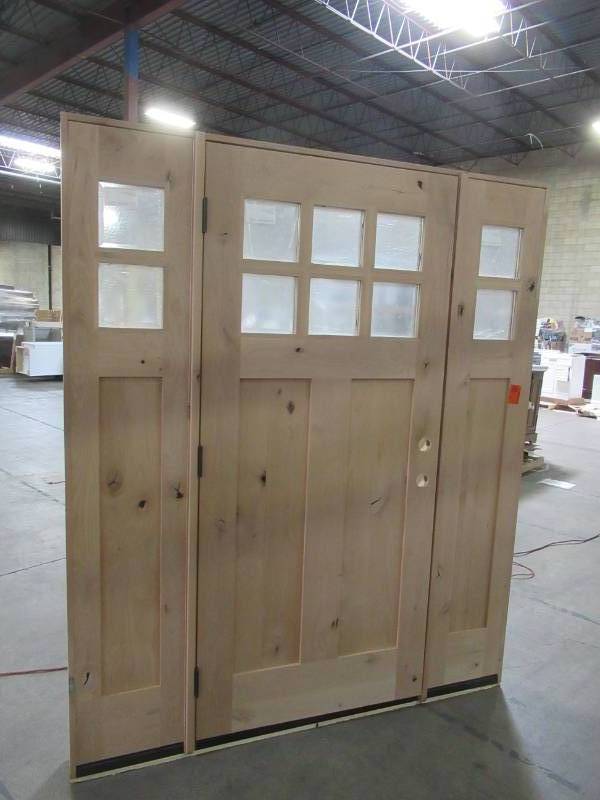 lot 613 image: Krosswood Doors Approximately 68 12 X 82 14 X 5 12 Jamb Wall. Unfinished, RH Inswing, Double Bore With 14 Lite and Matching Side Panels.