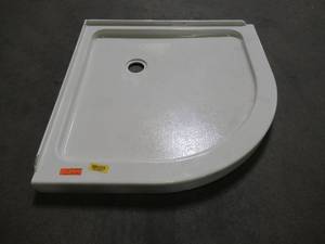 lot 211 image: American Standard 38 X 38 X 3 Corner Shower Base - Some Chips on Wainscot and bottom front edge of base.
