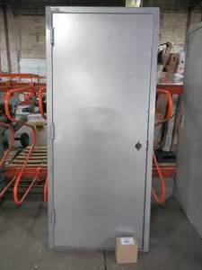lot 606 image: Armor Door Approximately 36 x 82 x 6 (32 x 79 Slab) Fire-Rated Gray RH Swing Flush Unfinished Steel Commercial Door Slab with Knock Down Frame and Hardware.