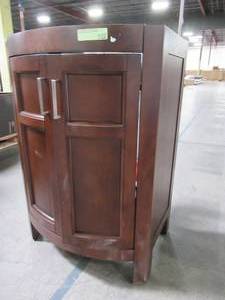 lot 212 image: Style Selections Morecott Chocolate Single Sink Vanity Cabinet. Approximately 22 14 x 16 x 32 58 Tall