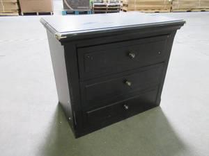 lot 215 image: 3 Drawer Nightstand in Black, Approximately 28 x 17 x 24 Tall, Includes (4) 4 Feet. - Scratches and dings.