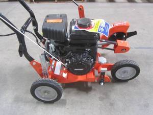 lot 1-714 image: Powermate 9 in. 79cc Gas Walk-Behind Edger with Curb Hopping Feature PWLE0799