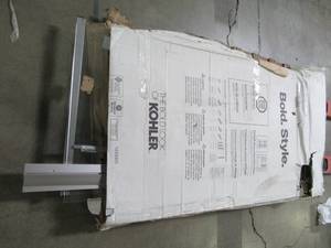 lot 130 image: KOHLER Levity 59.625-in W x 62-in H Frameless Bathtub Door R706000-L-SH - May be missing Pieces.