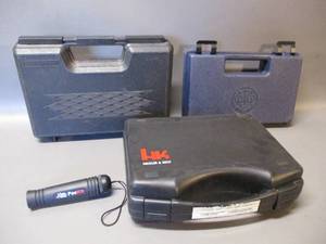 lot 119 image: Pistol cases and a Pockit