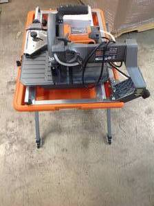 RIGID 9 Amp Corded 7 in. Wet Tile Saw with Stand in good conditions