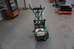 lot 30 image: Textron Model 544944A Power Sod Cutter