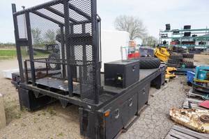 lot 23 image: 14 Oil Rig Up Flat Bed Truck Roust A Bout Box