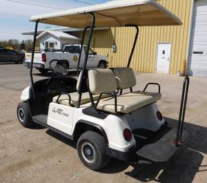 lot 13 image: 1999 Columbia 4PT Gas Powered Golf Cart with Canopy