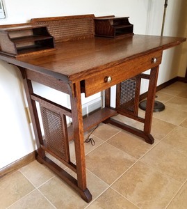 lot 109 image: Oak Library Table  with Cane Sides and Single Drawer