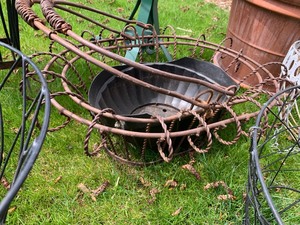 lot 137 image: Lot of Eight Yard Decorative Items